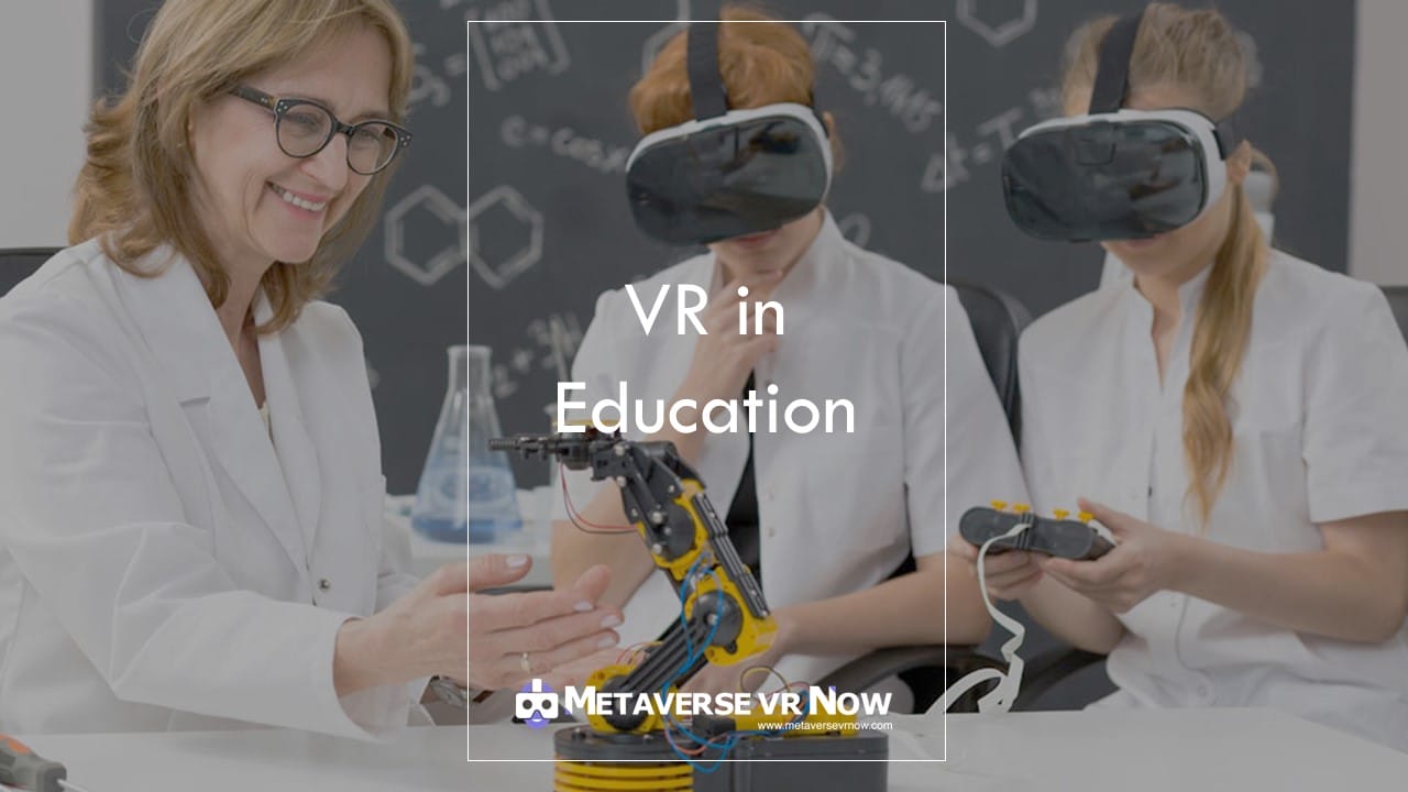 two girls using virtual reality in education, teacher smiling